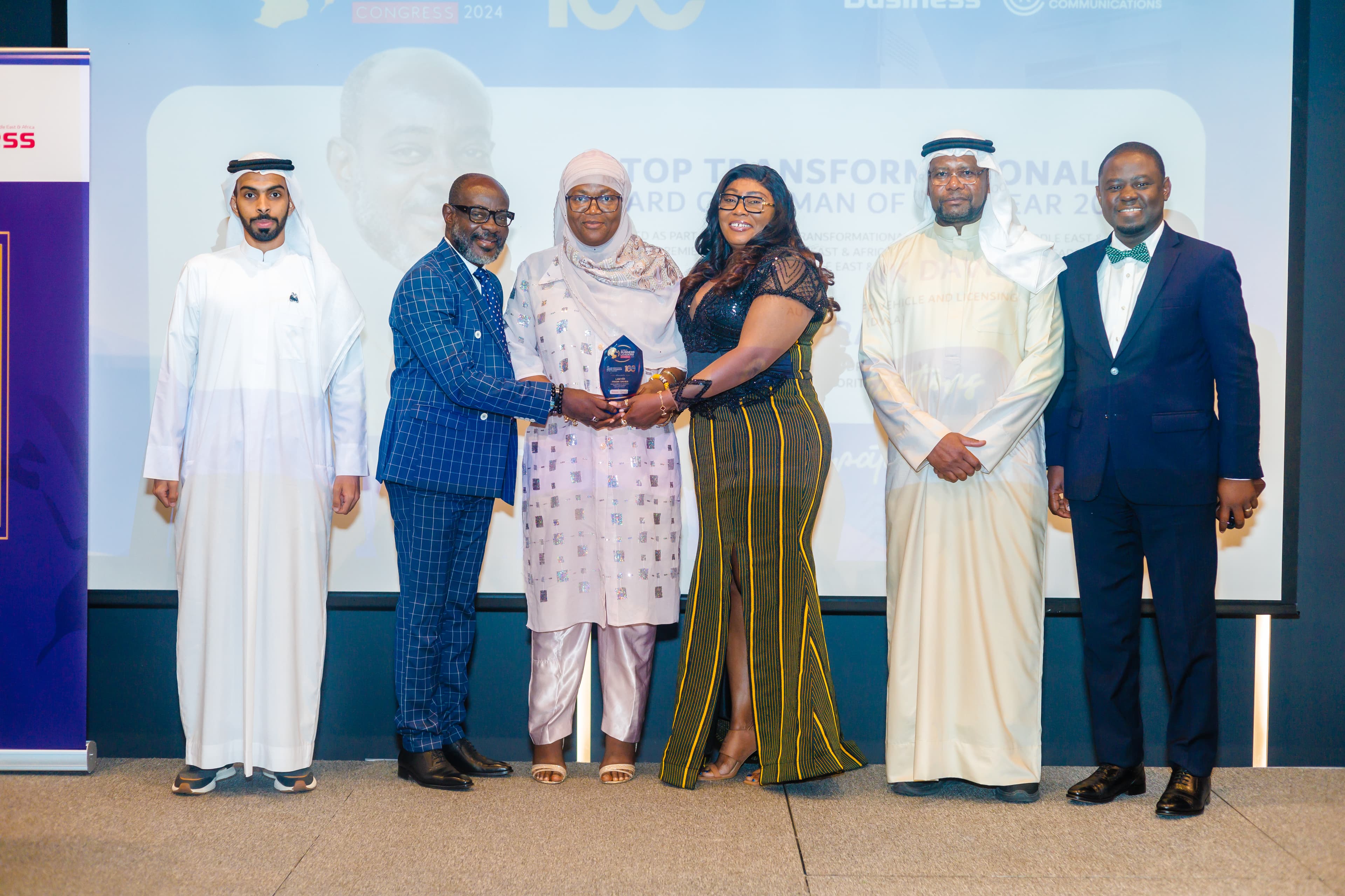 Senior executives in a formal setting representing institutional leadership and governance